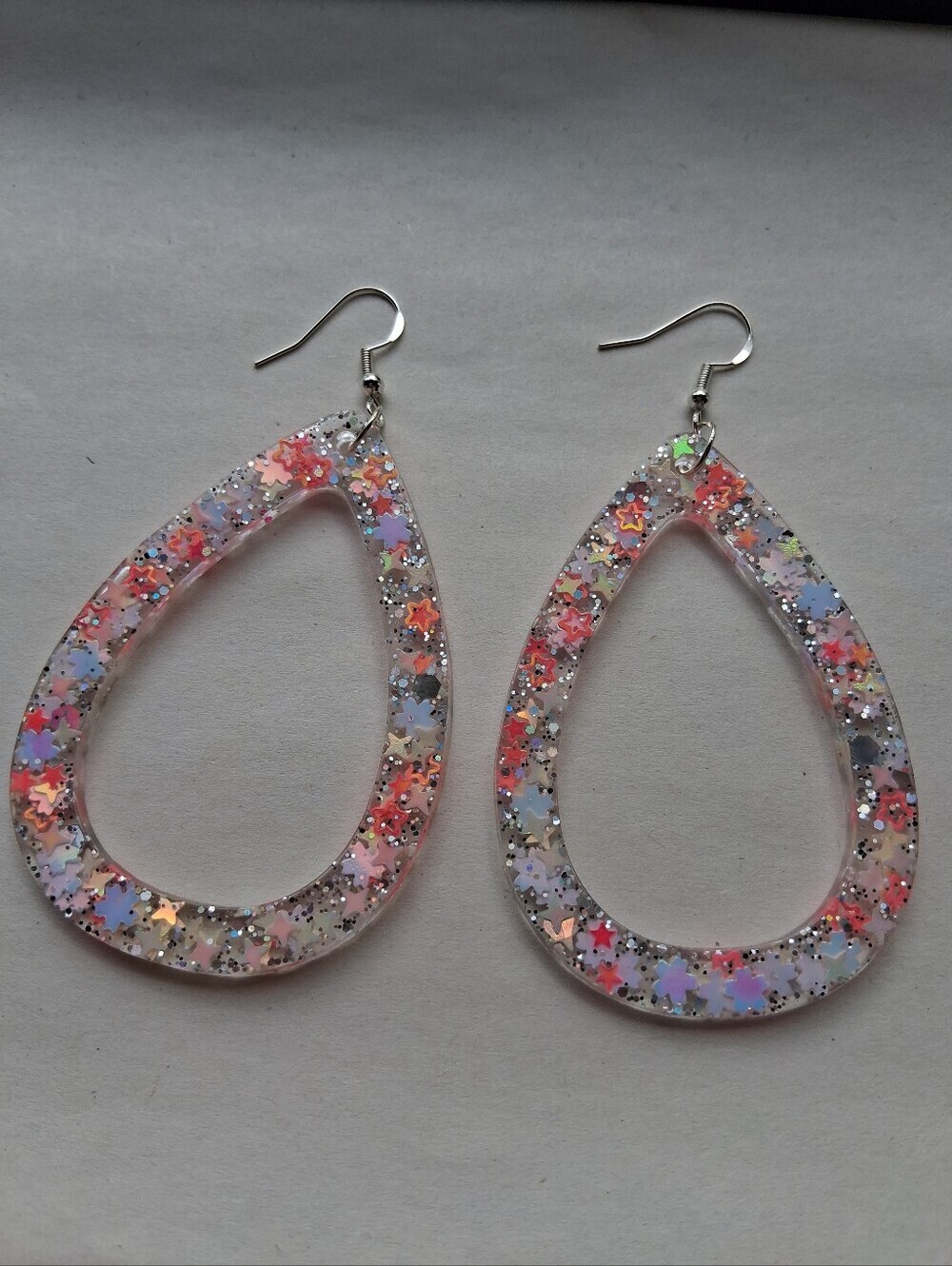 Hand Crafted Pink Glitter Teardrop Earrings with Multicolor Stars